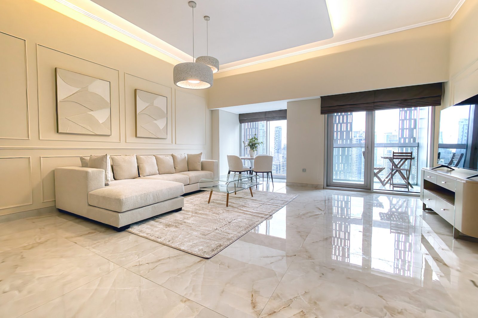 Interior Execution for UAE Homes by X Factor Designs featuring a completed bright living room with coordinated finishes, furniture, lighting, and flooring